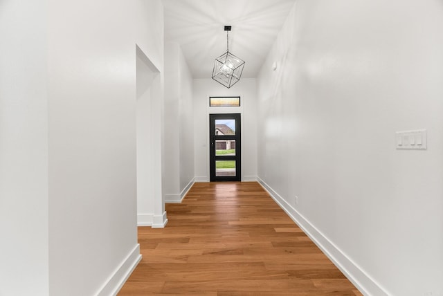 41 Haywood Ct, Little Rock, AR 72223 - doorway to outside with a chandelier and light wood finished floors