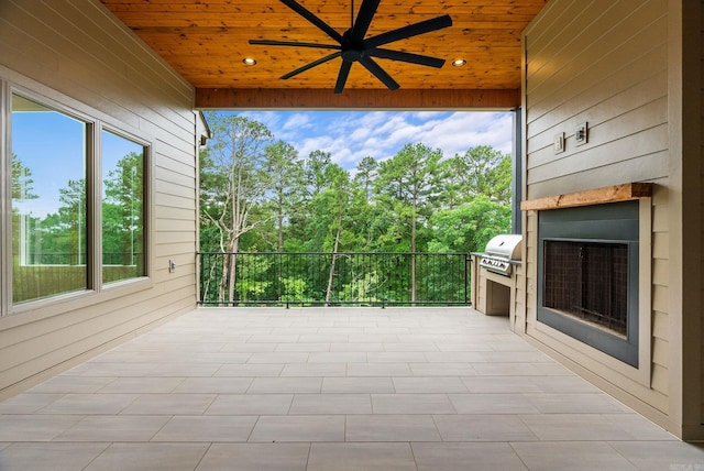 41 Haywood Ct, Little Rock, AR 72223 - view of patio featuring ceiling fan, view of wooded area, and a grill