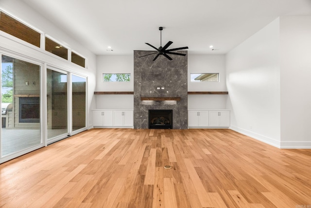 41 Haywood Ct, Little Rock, AR 72223 - unfurnished living room with a tile fireplace, wood finished floors, and recessed lighting