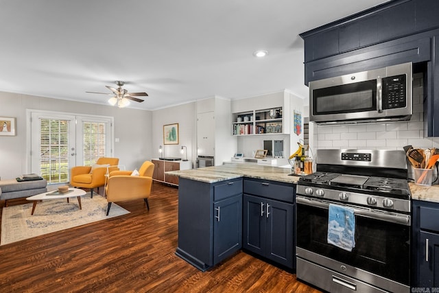 7002 Amherst Dr, Little Rock, AR 72205 - kitchen featuring stainless steel appliances, open floor plan, a peninsula, a ceiling fan, and dark wood finished floors