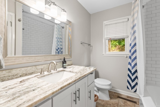 7002 Amherst Dr, Little Rock, AR 72205 - bathroom featuring vanity, tile patterned floors, and shower / bath combo with shower curtain