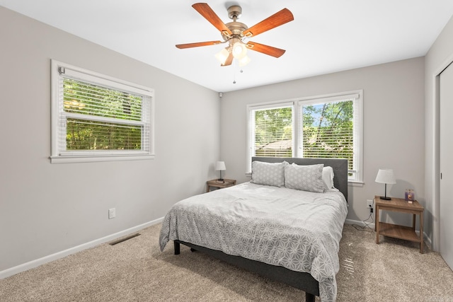 7002 Amherst Dr, Little Rock, AR 72205 - carpeted bedroom featuring baseboards and ceiling fan