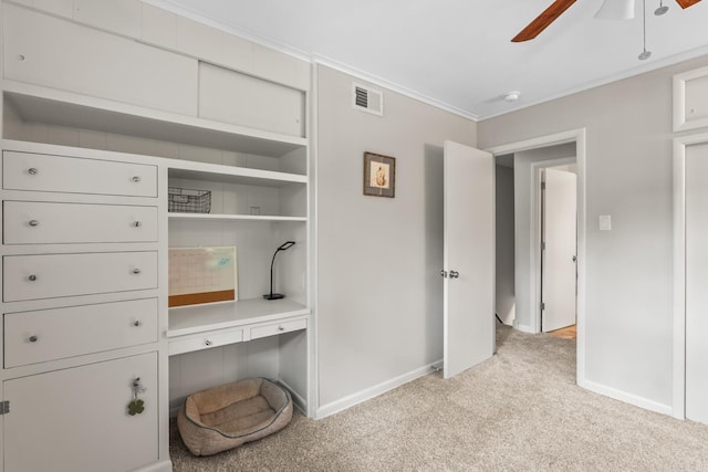 7002 Amherst Dr, Little Rock, AR 72205 - bedroom with light colored carpet, ornamental molding, and a ceiling fan