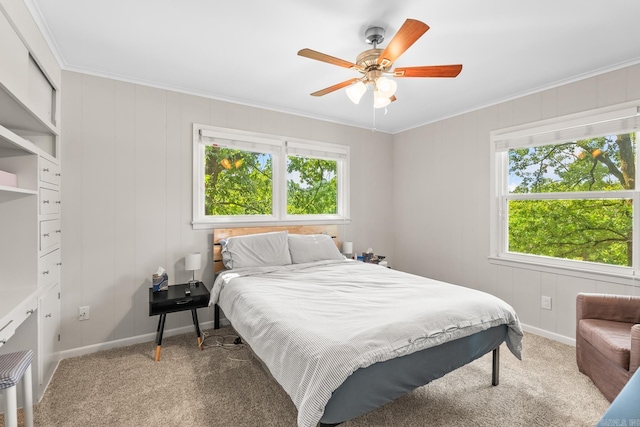 7002 Amherst Dr, Little Rock, AR 72205 - bedroom with multiple windows, carpet, crown molding, and a ceiling fan