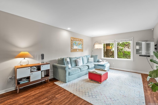 7002 Amherst Dr, Little Rock, AR 72205 - living area with wood finished floors and recessed lighting