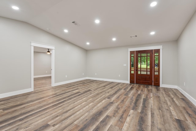 26 W Mobbs Cir, Greenbrier, AR 72058 - spare room featuring recessed lighting, wood finished floors, and vaulted ceiling