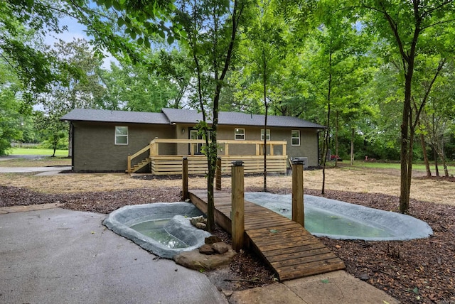 26 W Mobbs Cir, Greenbrier, AR 72058 - back of house featuring a deck