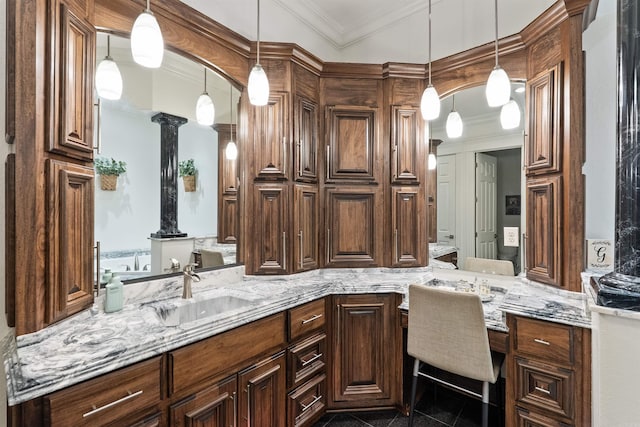 5090 Oakhurst Way, Conway, AR 72034 - bathroom featuring ornamental molding, vanity, decorative columns, and granite floors