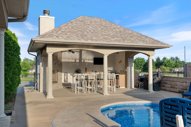 5090 Oakhurst Way, Conway, AR 72034 - view of swimming pool with a bar, ceiling fan, and a patio