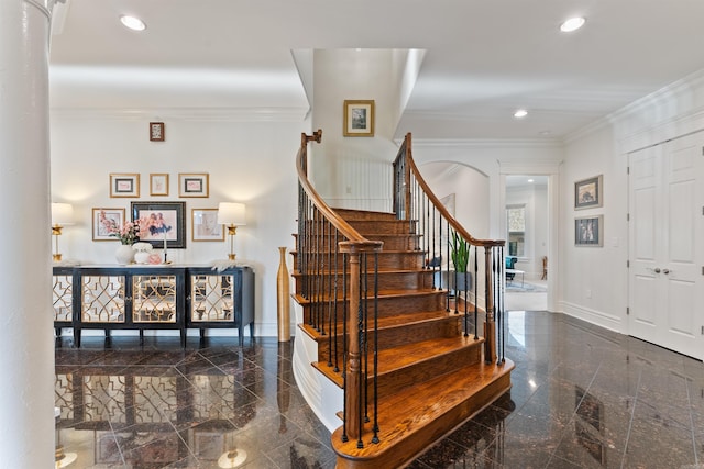 5090 Oakhurst Way, Conway, AR 72034 - stairway featuring granite tiled floors, recessed lighting, crown molding, and arched walkways