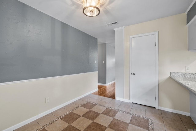 9317 Cynthia Dr, Little Rock, AR 72204 - unfurnished dining area featuring tile patterned floors and inlaid floor details
