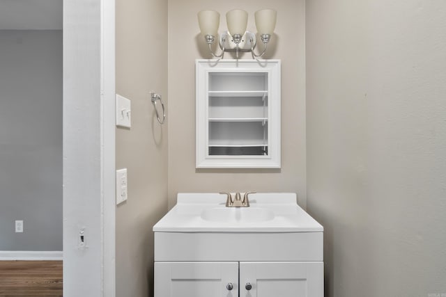 9317 Cynthia Dr, Little Rock, AR 72204 - bathroom with vanity and wood finished floors