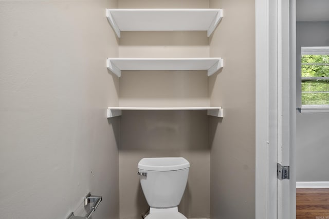 9317 Cynthia Dr, Little Rock, AR 72204 - bathroom with toilet and wood finished floors