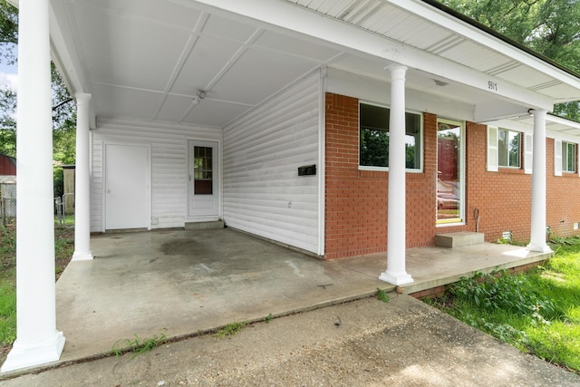 9317 Cynthia Dr, Little Rock, AR 72204 - view of patio / terrace with an attached carport