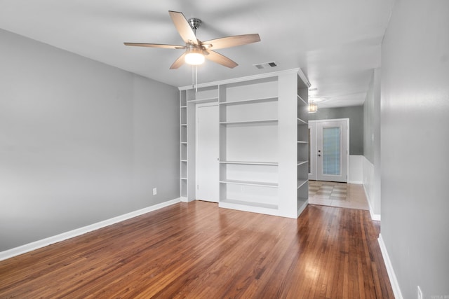 9317 Cynthia Dr, Little Rock, AR 72204 - unfurnished bedroom featuring wood finished floors, ceiling fan, and a closet