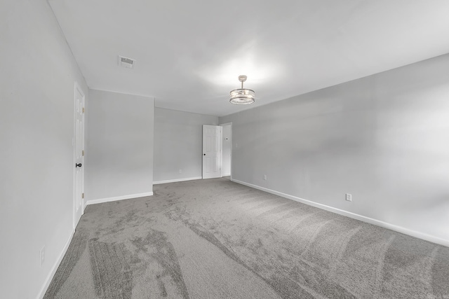 1550 E Main St, Austin, AR 72007 - spare room featuring carpet and baseboards