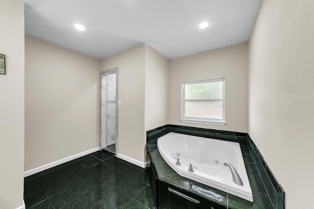 1550 E Main St, Austin, AR 72007 - bathroom featuring a tub with jets and recessed lighting