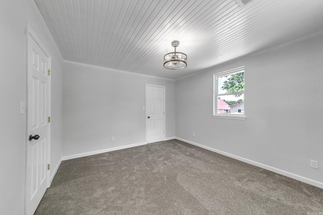 1550 E Main St, Austin, AR 72007 - spare room featuring a chandelier, dark carpet, ornamental molding, and wooden ceiling