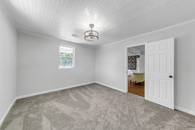 1550 E Main St, Austin, AR 72007 - unfurnished room with carpet floors, a chandelier, ornamental molding, and wooden ceiling