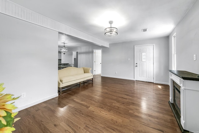 1550 E Main St, Austin, AR 72007 - bedroom featuring a chandelier and dark wood-style floors
