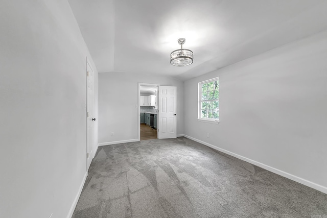 1550 E Main St, Austin, AR 72007 - unfurnished bedroom with a chandelier, carpet, and ensuite bathroom
