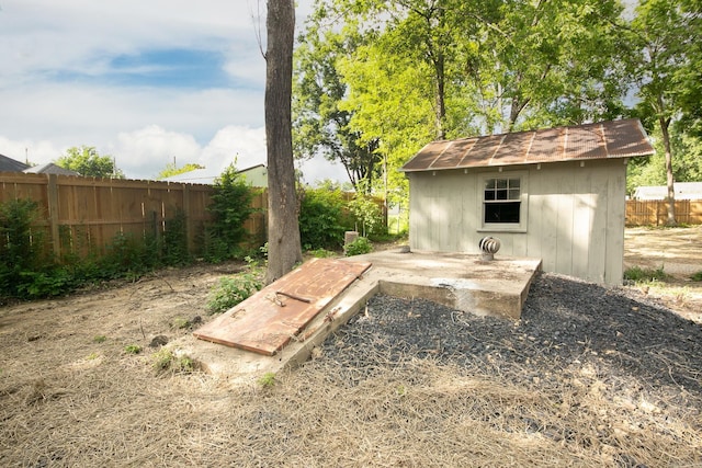 1550 E Main St, Austin, AR 72007 - fenced backyard with a storage unit