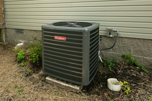 1550 E Main St, Austin, AR 72007 - exterior view of a central AC unit and crawl space