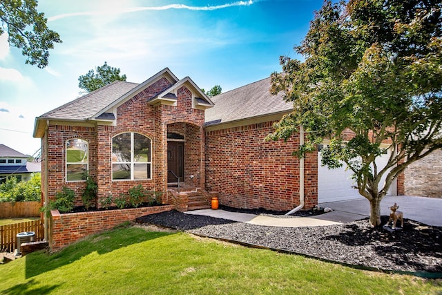 3200 Overcup Dr, Sherwood, AR 72120 - view of front facade featuring brick siding, a shingled roof, concrete driveway, and a garage