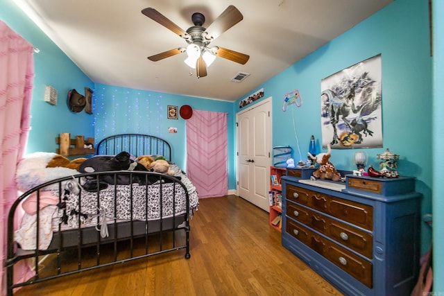 3200 Overcup Dr, Sherwood, AR 72120 - bedroom with wood finished floors and a ceiling fan