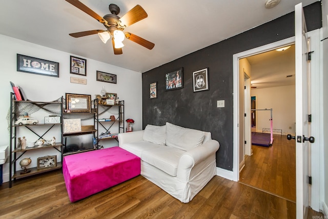 3200 Overcup Dr, Sherwood, AR 72120 - living area with wood finished floors and ceiling fan