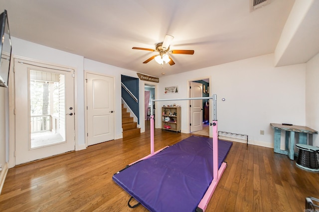3200 Overcup Dr, Sherwood, AR 72120 - bedroom with wood finished floors, ceiling fan, and access to outside