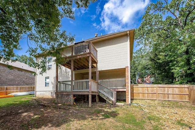 3200 Overcup Dr, Sherwood, AR 72120 - rear view of property with a wooden deck