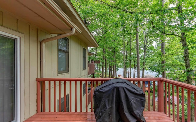 5 Torre Del Mar Way, Hot Springs Village, AR 71909 - wooden terrace featuring grilling area, a water view, and view of scattered trees