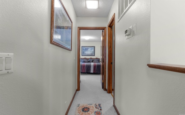 5 Torre Del Mar Way, Hot Springs Village, AR 71909 - hallway featuring light colored carpet and a textured ceiling