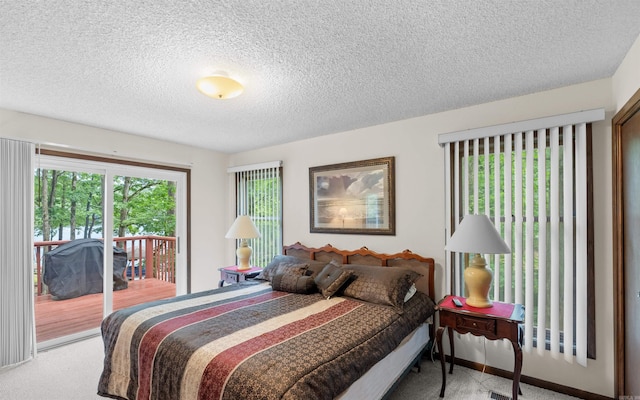 5 Torre Del Mar Way, Hot Springs Village, AR 71909 - bedroom with access to exterior, light carpet, and a textured ceiling