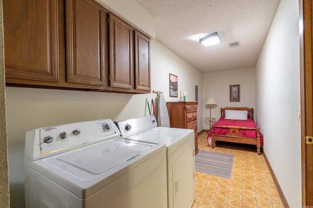 5 Torre Del Mar Way, Hot Springs Village, AR 71909 - washroom with cabinet space, washer and dryer, light tile patterned flooring, and a textured ceiling