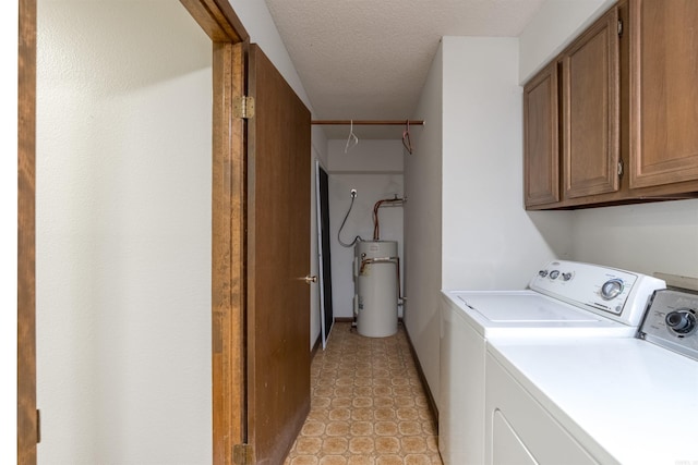 5 Torre Del Mar Way, Hot Springs Village, AR 71909 - laundry area with water heater, washer and dryer, cabinet space, light tile patterned flooring, and a textured ceiling