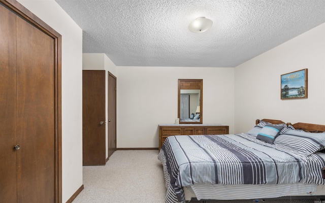 5 Torre Del Mar Way, Hot Springs Village, AR 71909 - bedroom featuring light colored carpet and a textured ceiling