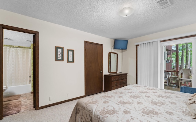 5 Torre Del Mar Way, Hot Springs Village, AR 71909 - bedroom with a textured ceiling, access to exterior, carpet, and a closet