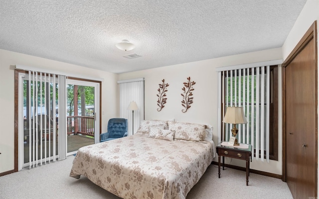 5 Torre Del Mar Way, Hot Springs Village, AR 71909 - bedroom with access to outside, light colored carpet, and a textured ceiling