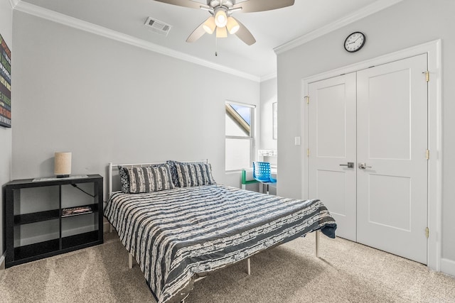 301 Kanis Ridge Dr, Little Rock, AR 72223 - carpeted bedroom with ornamental molding, a closet, and ceiling fan