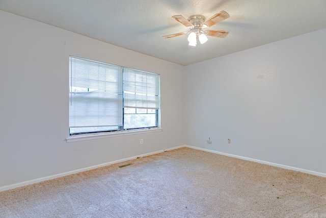 1304 Dupwe Dr, Jonesboro, AR 72401 - carpeted spare room with baseboards and a ceiling fan