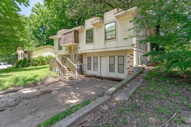 1304 Dupwe Dr, Jonesboro, AR 72401 - view of front facade with brick siding