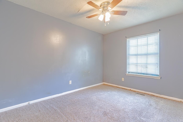 1304 Dupwe Dr, Jonesboro, AR 72401 - carpeted empty room featuring ceiling fan and a textured ceiling