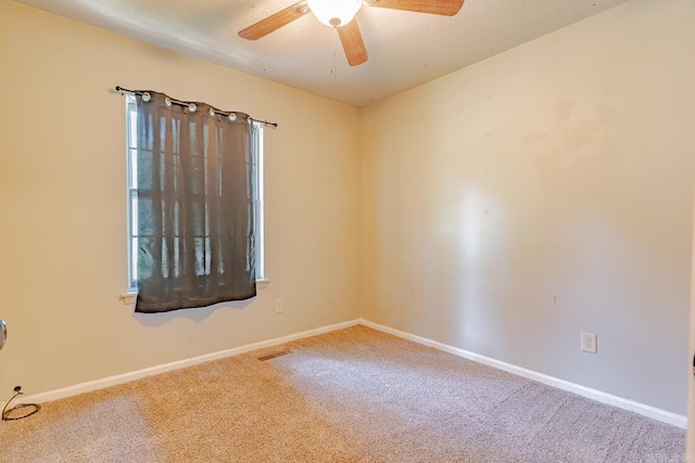1304 Dupwe Dr, Jonesboro, AR 72401 - carpeted empty room featuring a ceiling fan and baseboards