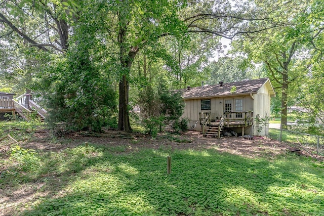 1304 Dupwe Dr, Jonesboro, AR 72401 - view of yard with stairs and a deck