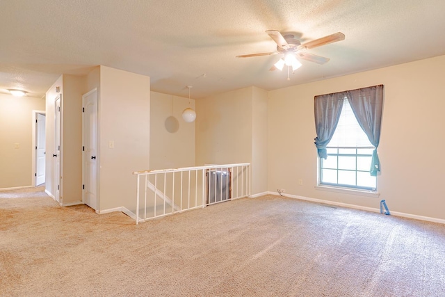 1304 Dupwe Dr, Jonesboro, AR 72401 - carpeted spare room with a textured ceiling and ceiling fan