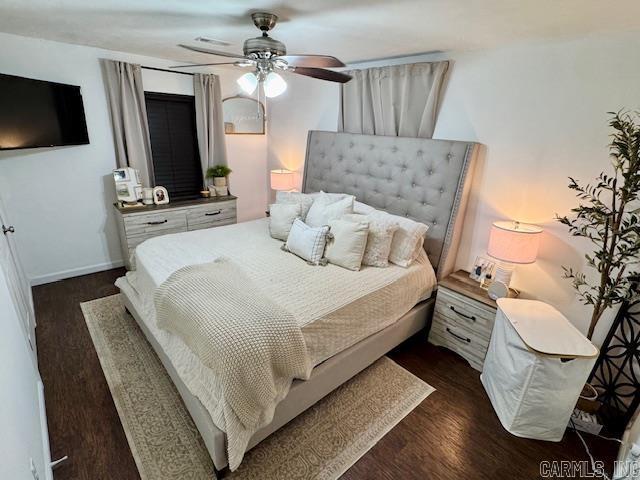 117 S Briarwood, Sheridan, AR 72150 - bedroom with dark wood-style flooring and a ceiling fan