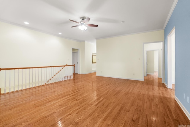 2219 Westport Loop, Little Rock, AR 72212 - spare room featuring ceiling fan, crown molding, light wood-style flooring, and recessed lighting