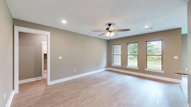 56 Blair, Vilonia, AR 72173 - empty room featuring a ceiling fan, light wood finished floors, and recessed lighting